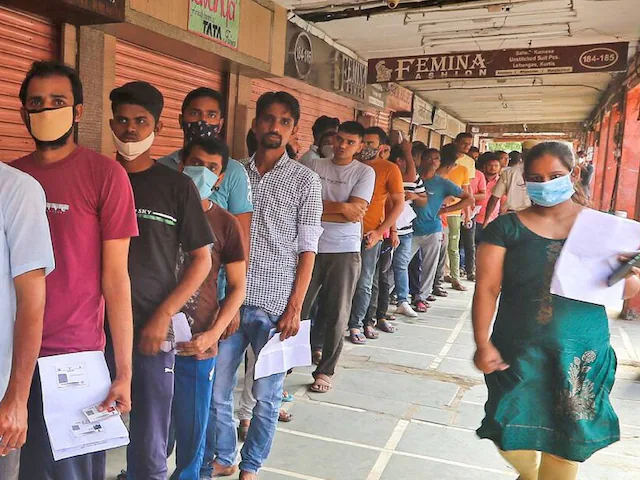 People standing in line for job