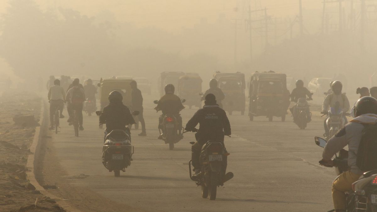 Smog covers a northern city, illustrating severe air pollution issues